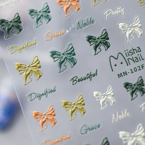 5D reliëf nail art stickers met kleurrijke strikjes en artistieke lettertype ontwerpen