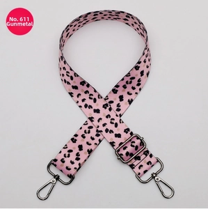 Adjustable pink leopard print shoulder strap with gunmetal swivel snap hooks and buckles