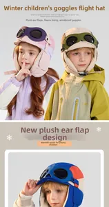 Detail of children's winter pilot hat with goggles and warm fleece ear protection