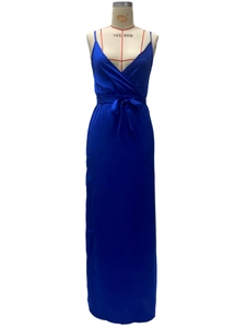 Detail of the royal blue V-neck dress with a waist bow tie and elegant silk satin texture