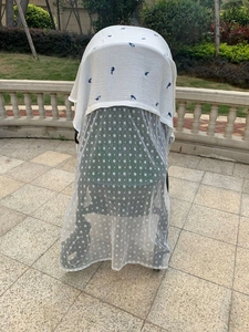 Baby stroller cover with blue seahorse cotton fabric and white floral lace mesh detail