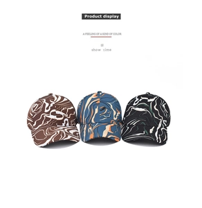 Detailed flat lay of three baseball caps with colorful marble and fluid paint prints