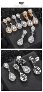 Detail of pear-cut cubic zirconia earrings in silver, gold, and rose gold finishes