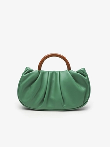Green ruched cloud bag with large brown resin round handle on a white background