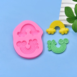 Rainbow wave silicone mold for DIY soap and fondant crafting on blue background