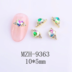 Macro detail of aurora heart nail gems with gold base, size 10x5mm, code MZH-9363