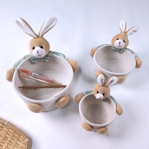 Three-piece set of white woven cotton rope storage baskets with cute plush rabbit decor