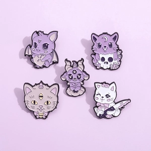 Cute set of 5 purple enamel pins with cartoon cat skull and gothic bat designs