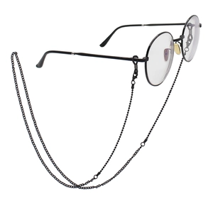 Fashionable black round frame eyeglasses with stylish metal bead strap on white background