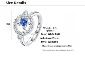 Detail of star ring with blue zircon and size guide, adjustable silver-toned band