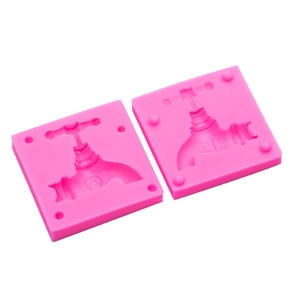 Pink silicone faucet mold set for cake decorating and creative fondant baking shapes