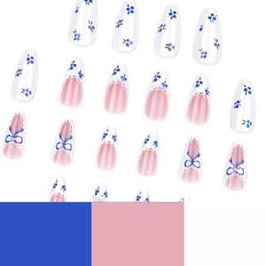 French blue and white almond press-on nails with blueberry patterns and bow accents