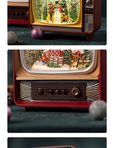 Detailed close-up of retro TV music box with snowman scene and control knobs