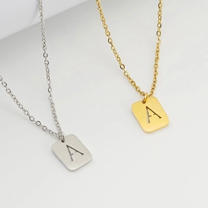 Polished gold and silver stainless steel necklace with square A-letter pendant