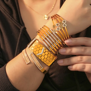 Fashionable hollow tree and geometric gold plated cuff bracelets with zircon for women