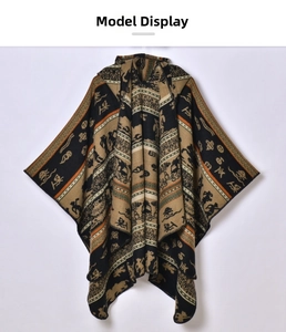 Detailed view of ethnic knit shawl featuring intricate tribal hunting pattern and totem motifs