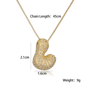 Detailed view of gold plated initial pendant necklace with dimensions and weight specs