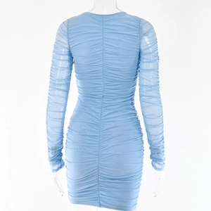 Rear view of light blue mesh dress showing ruched details and fitted silhouette on mannequin