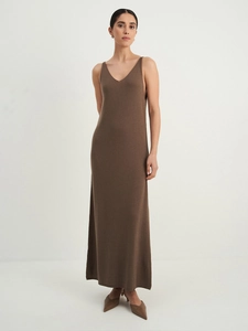 Close-up detail of soft knit texture and V-neck design on this brown maxi dress