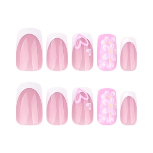 Pink and white french manicure press-on nails with heart and floral designs