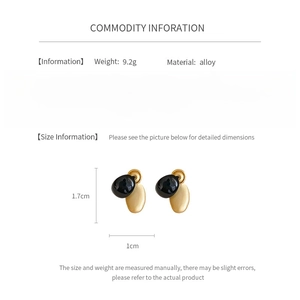 Detailed size specifications for oval earrings in gold and black alloy, 1.7cm in height