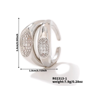 Detailed view of silver double-layered open ring with measurements and zircon inlays