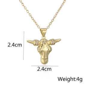 Detail view of 18K gold bull head pendant necklace with diamonds, 2.4cm size and 4g weight
