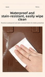 Close-up of brown leather cosmetic bag showing waterproof surface and easy cleaning