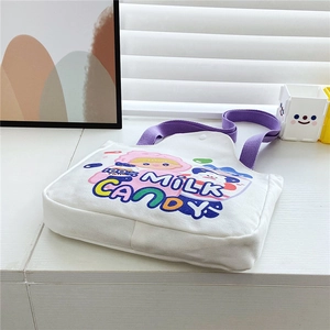 White canvas tote bag with purple straps and cute cartoon milk candy print for daily use