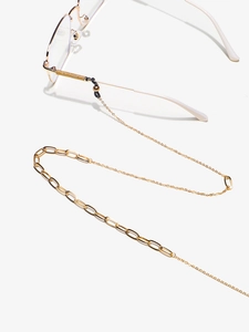 Détail de la chaîne de lunettes dorée en acier inoxydable avec boucles en silicone