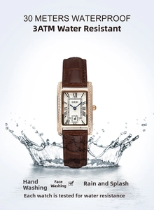Detail of vintage square quartz watch with 3ATM water resistance and brown leather strap