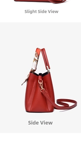 Side view of red lychee grain leather bucket bag with decorative floral silk scarf