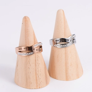 Minimalist Roman numeral knotted ring set in rose gold and silver finish with pavé crystals