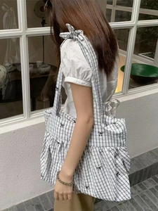 Black and white checkered tote bag with bow details and ruffled pleated hem for women