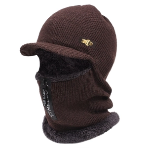Detail of winter knit hat with soft fleece lining, front zipper and protective ear flaps