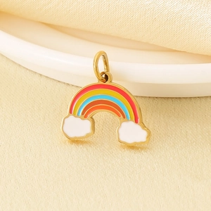 Macro shot of a stainless steel rainbow charm with colorful enamel and clouds detail