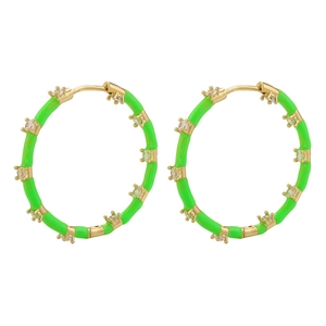 Detail view of large gold-plated hoop earrings with neon green enamel and micro-set cubic zirconia