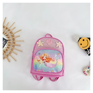 Detailed close-up of pink mermaid sequins backpack with decorative starfish and shells