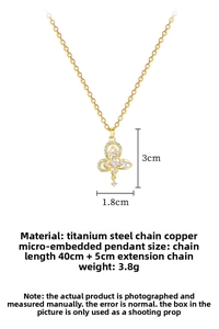 Detailed view of gold butterfly necklace with micro-pave cubic zirconia crystals