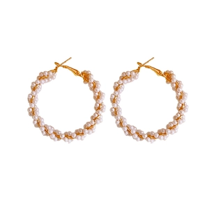 Elegant French vintage gold hoop earrings with intertwined white pearls for women