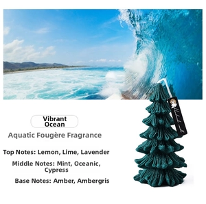 Detail of green tree candle with marine scent notes including lemon, lavender and mint