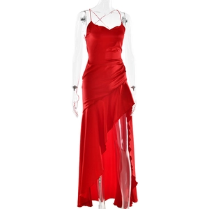 Detailed view of red satin dress with asymmetric ruffled hemline and high-low cut