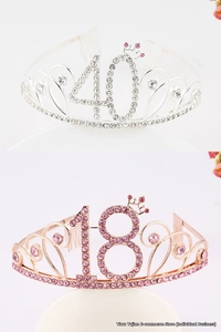 Detail of silver 18 and rose gold 40 rhinestone tiaras with crystal birthday crowns