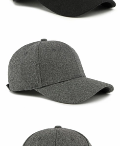 Detail of wool blend dark grey baseball cap showing textured fabric and eyelets
