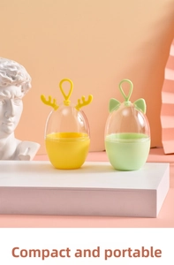 Portable makeup sponge travel cases with cute deer and cat ears on a stylish display