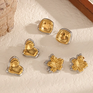 Three pairs of two-tone stainless steel earrings in square, heart, and flower shapes