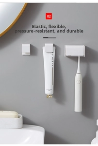 Macro detail of elastic white wall-mounted toothbrush holders clamping items