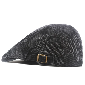 Close-up of vintage ivy cap texture with adjustable denim strap and bronze buckle