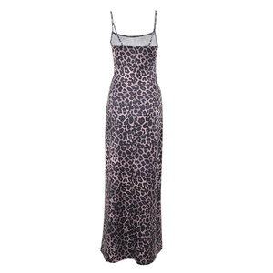 Detail of elegant leopard print maxi dress showing thin straps and open back design