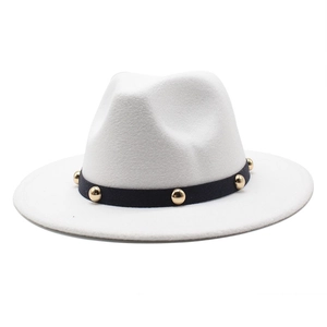 White wool fedora with a black band featuring gold studs, classic wide brim hat detail